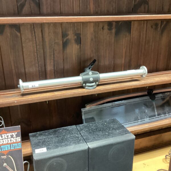 Vintage walnut magazine rack for home storage and display.