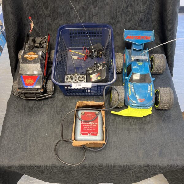 Vintage Harley Davidson and Tamiya remote control cars lot.