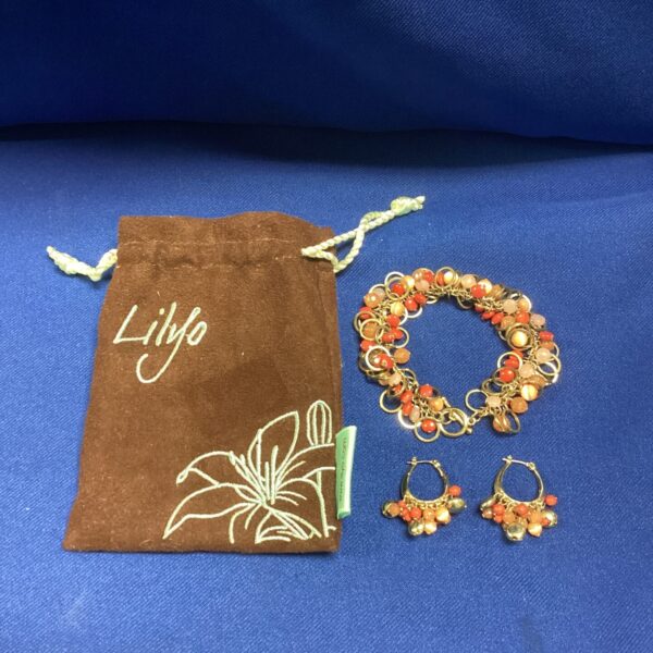 Vintage costume jewellery set with faux coral beads and gold accents.