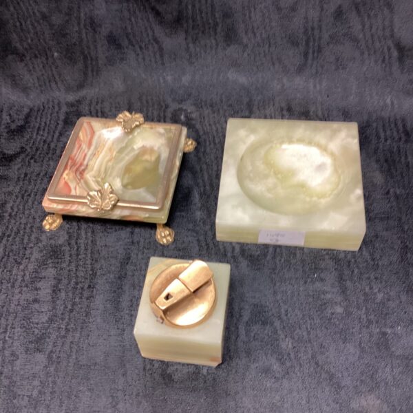 Vintage marble tray with gilded feet, a retro serving dish.