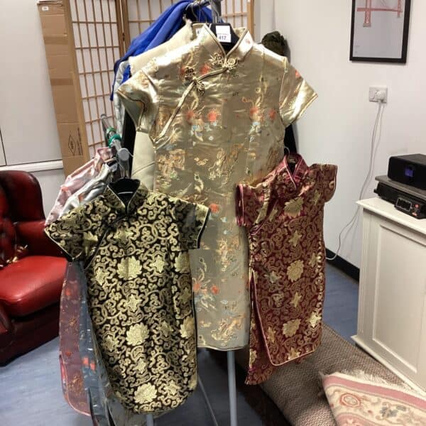 Vintage Chinese silk jacket with intricate floral embroidery.