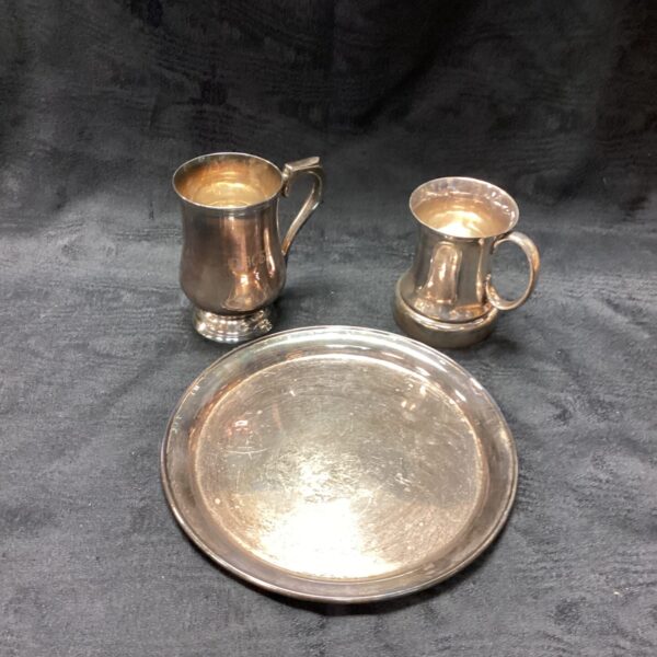 Antique pewter tankard, a vintage collectible drinking vessel.