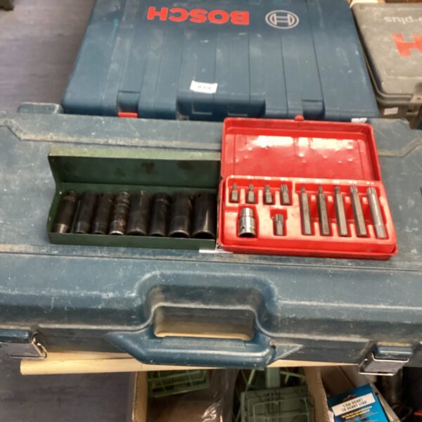 Vintage Bosch drill bit set in a blue plastic case, workshop tools.