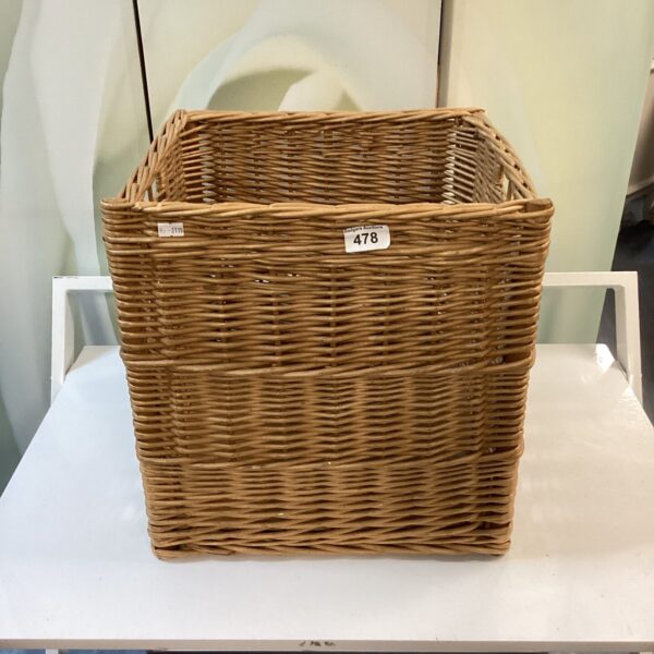 Vintage wicker basket with a classic woven design.