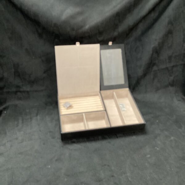 Vintage wooden magazine rack for storing magazines and papers.