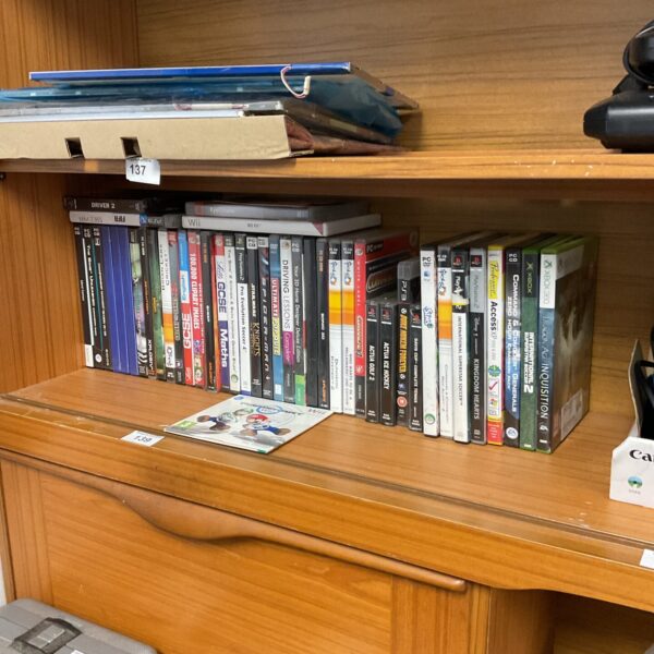 Video game lot including Xbox 360, PlayStation 3, and Wii games.