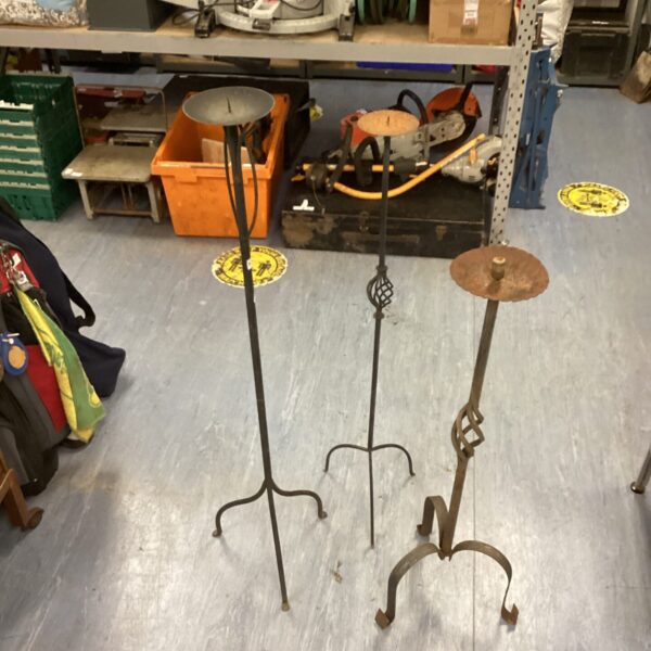 Antique Victorian fire screen with tripod base and circular panel.