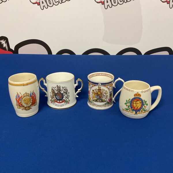 Antique lot of four commemorative cups and tankards.