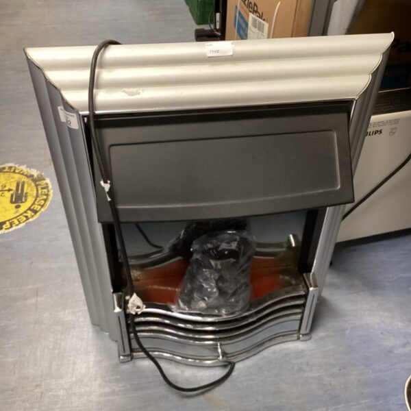 Vintage Dimplex electric fireplace with coal effect design.