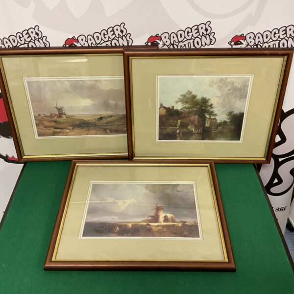 Framed set of three vintage windmill prints for wall decor.