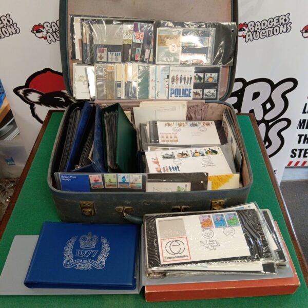 Large collection of British First Day Covers in a carrying case.