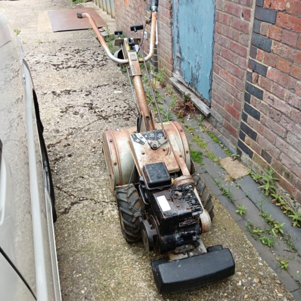 Front view of a Lawnflite MTD petrol rotavator.