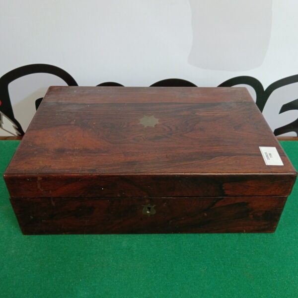 Vintage mahogany writing slope with inlaid star detail.