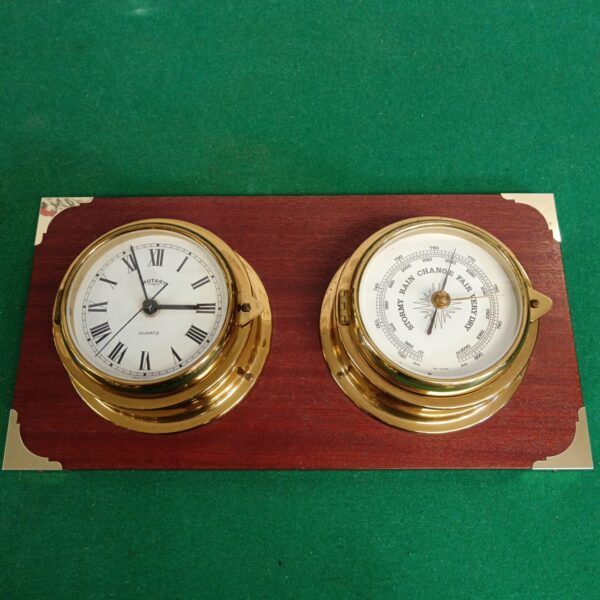 Vintage Rotary barometer clock with west German barometer.