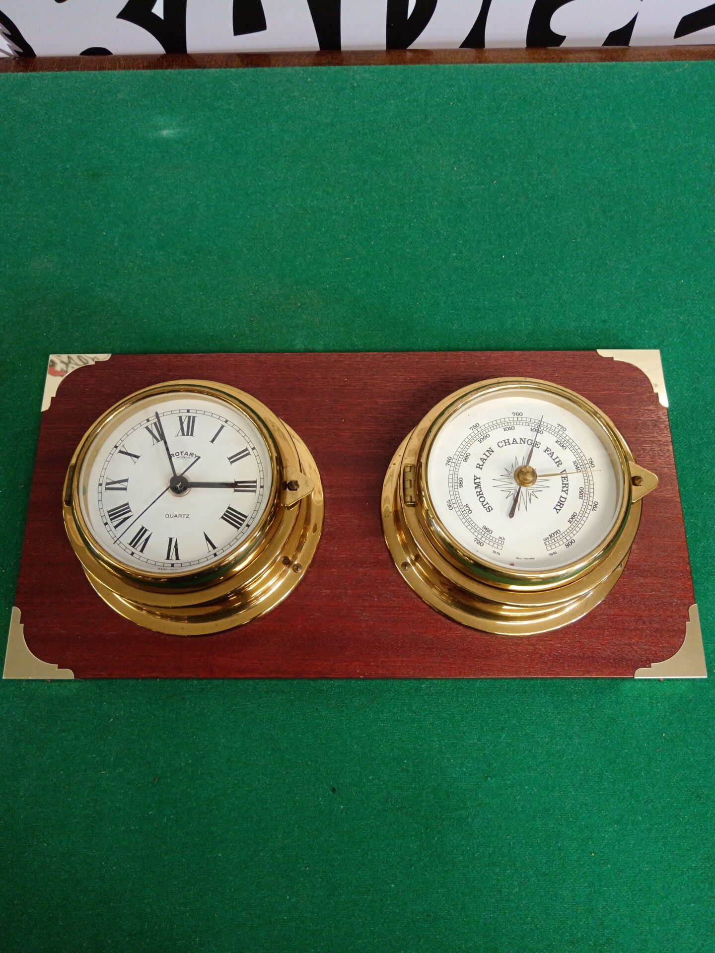 025 Rotary quartz clock with west German barometer