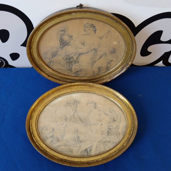 Pair of antique Giovanni Battista Cipriani drawings in oval frames.