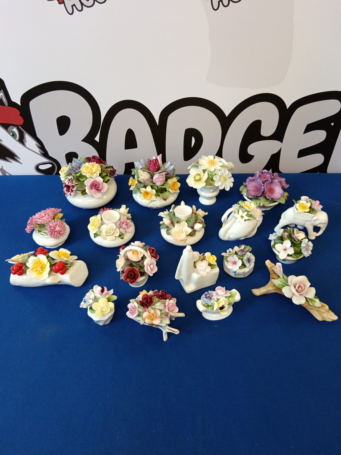 044 Collection of porcelain flowers including royal albert