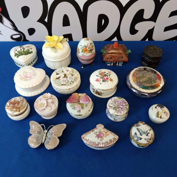 Overview of a collection of vintage and decorative trinket pots.