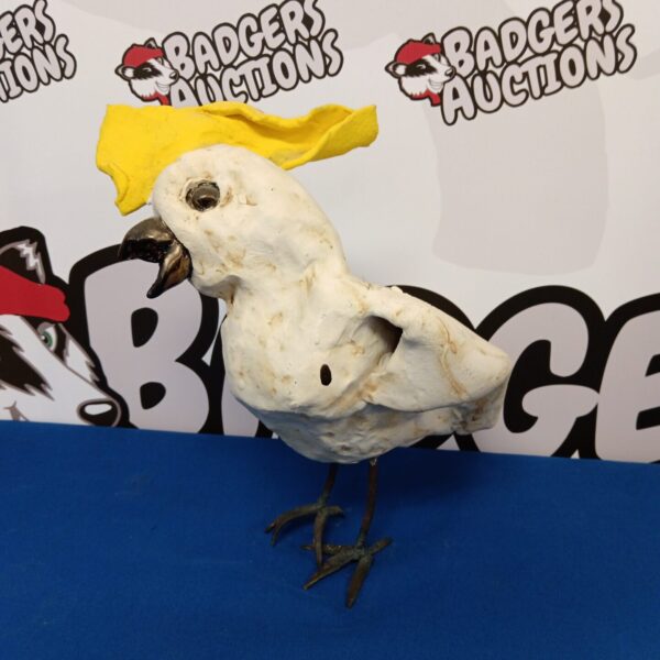 Vintage Australian pottery cockatoo figurine with metal legs.
