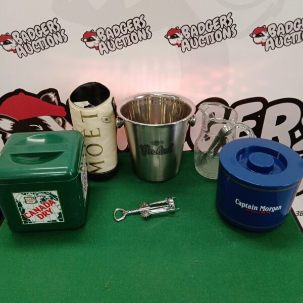Vintage ice buckets including Grolsch and Captain Morgan branding.