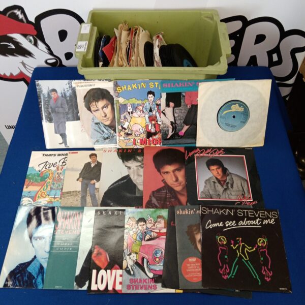 Shakin Stevens vinyl record collection, 1980s pop music singles.