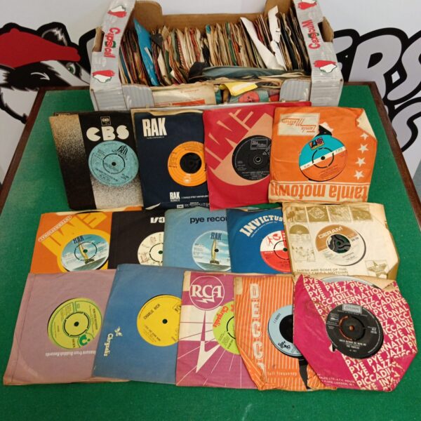 Vintage 7" vinyl records collection with Pye, Rak, and Invictus labels.