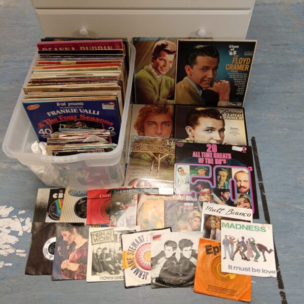 Vintage vinyl record collection lot with various artists and genres.