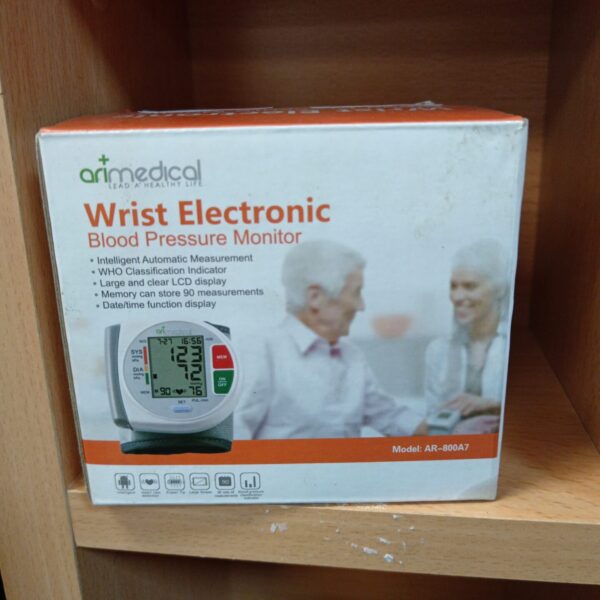 Arimedical wrist blood pressure monitor with digital display.