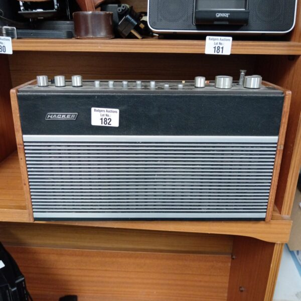 Vintage Hacker RP-75 radio in wooden cabinet.