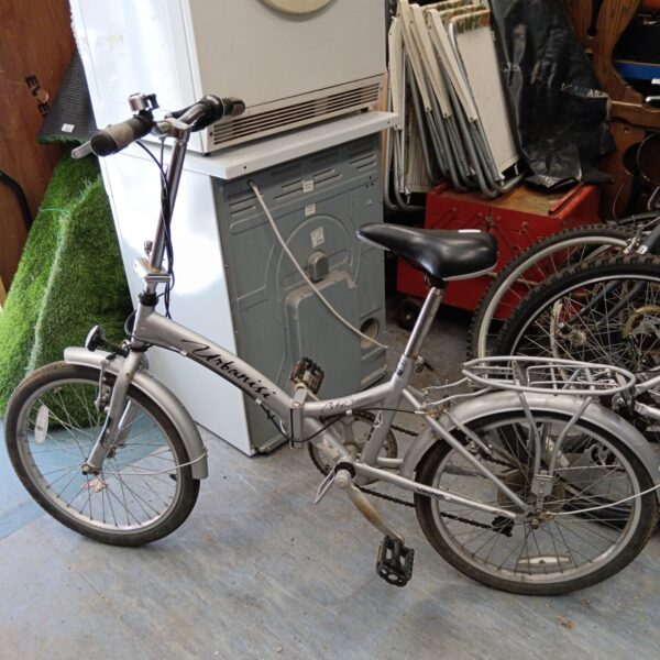 Silver Urbanista city folding bicycle in used condition.