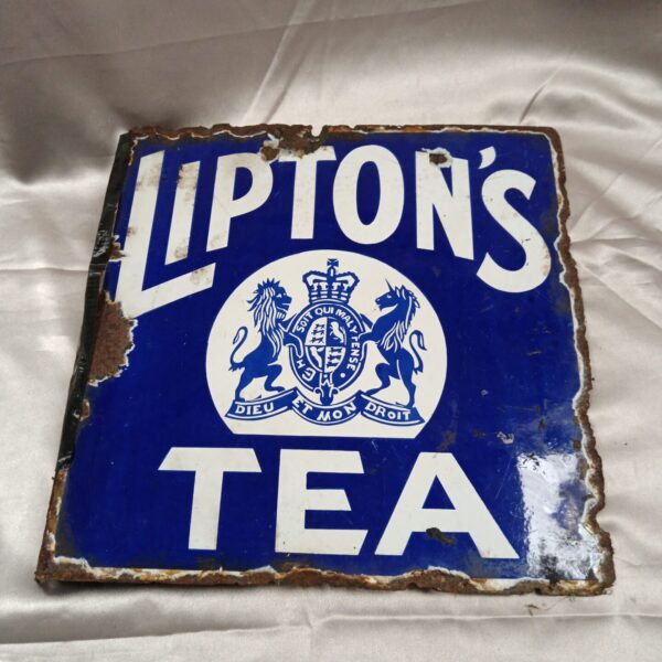 Vintage Lipton's Tea enamel sign with heraldic crest.