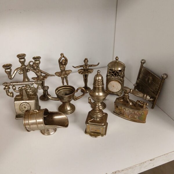 Vintage miniature household collection with ballerina figurine.