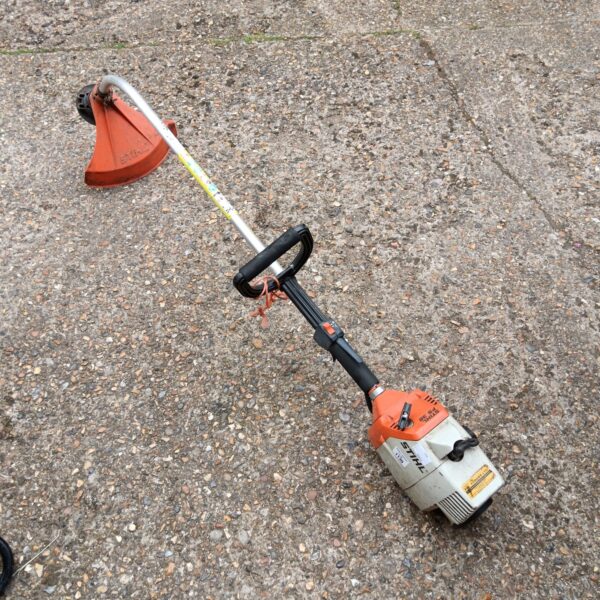 Used Stihl FS36 petrol grass strimmer for garden maintenance.