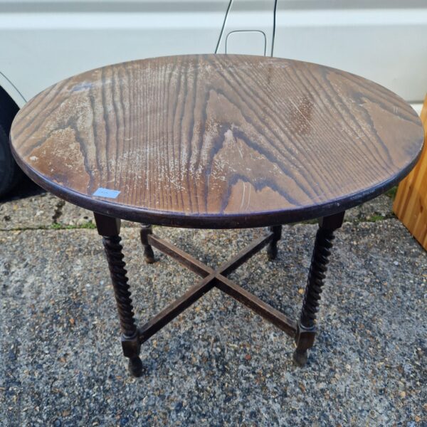 Vintage oak twist leg round table for farmhouse decor.
