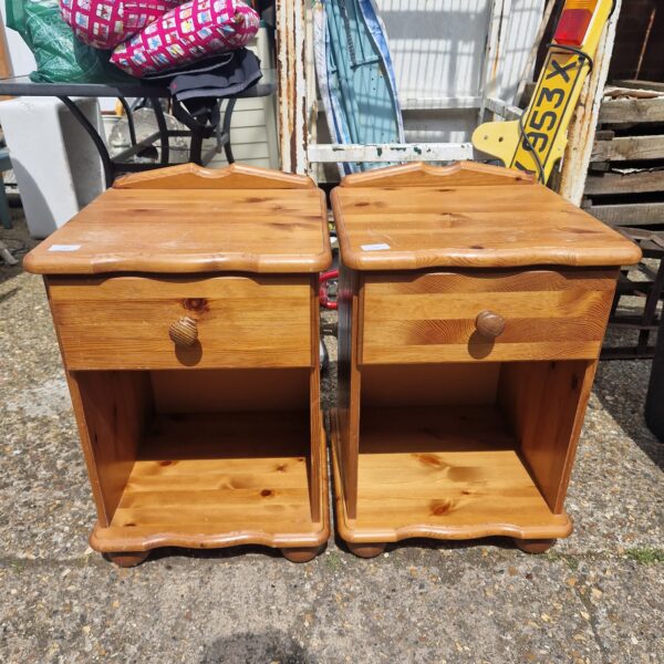 Pair of vintage pine bedside cabinets with a single drawer.