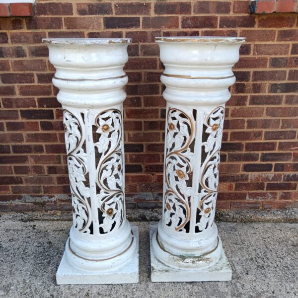 Ornate fibreglass plinths with floral detailing for garden or home display.