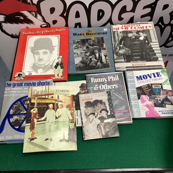 Vintage film ephemera books, including Charlie Chaplin and Miller's Movie Collectibles.