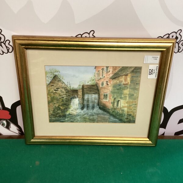 Framed watercolour painting of a classic water wheel in a rural setting.