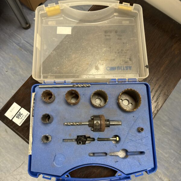 Drill bit set with various attachments in a carrying case.
