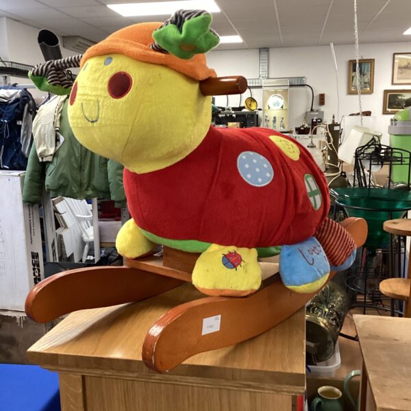 Vibrant red Mamas & Papas rocking bug for babies and toddlers.
