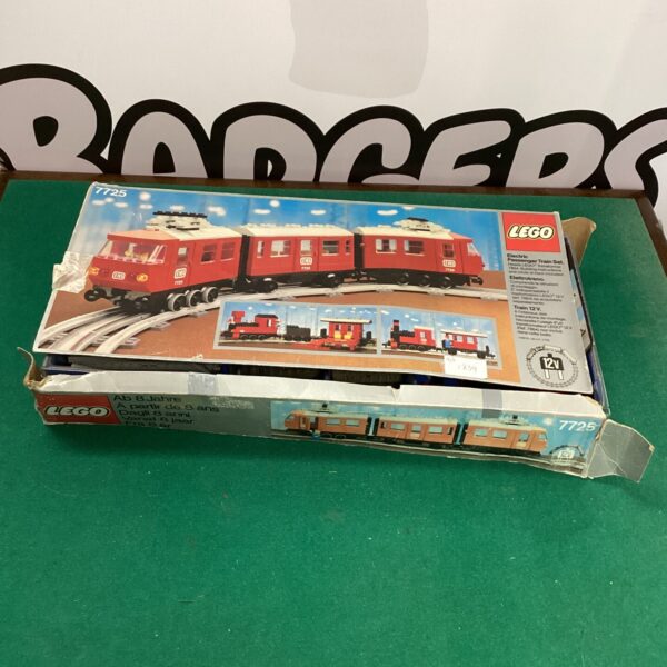 Vintage Lego 7725 train set in original box, collectible toy.