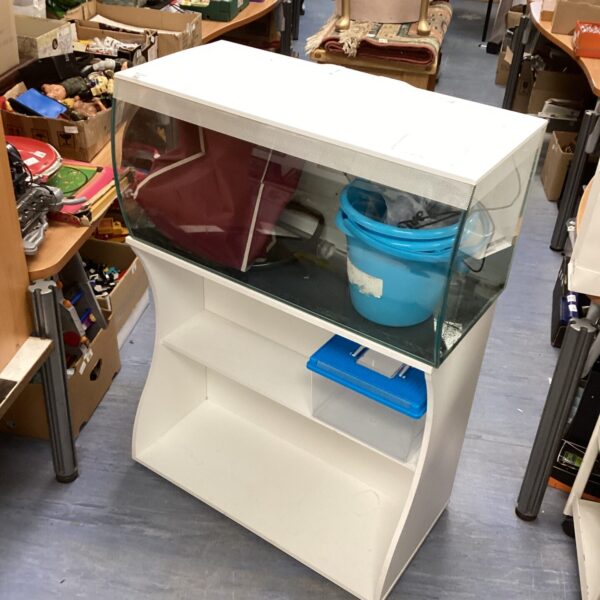 Large Fluval fish tank with white stand, ideal for freshwater aquariums.