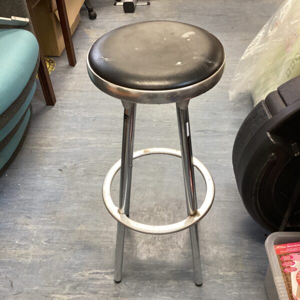 Vintage stainless steel adjustable stool with leather seat.