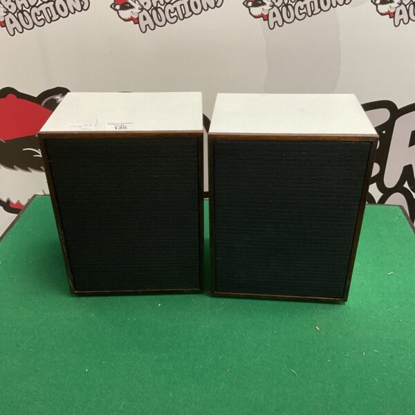 Vintage bookshelf speakers, a pair of retro stereo speakers.