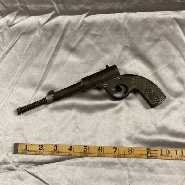 Side view of a vintage Cub pistol, antique handgun.