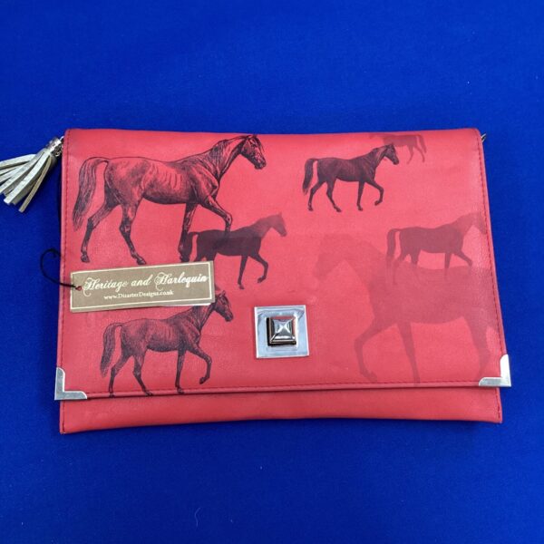Red Heritage & Harlequin clutch bag, stylish evening accessory.