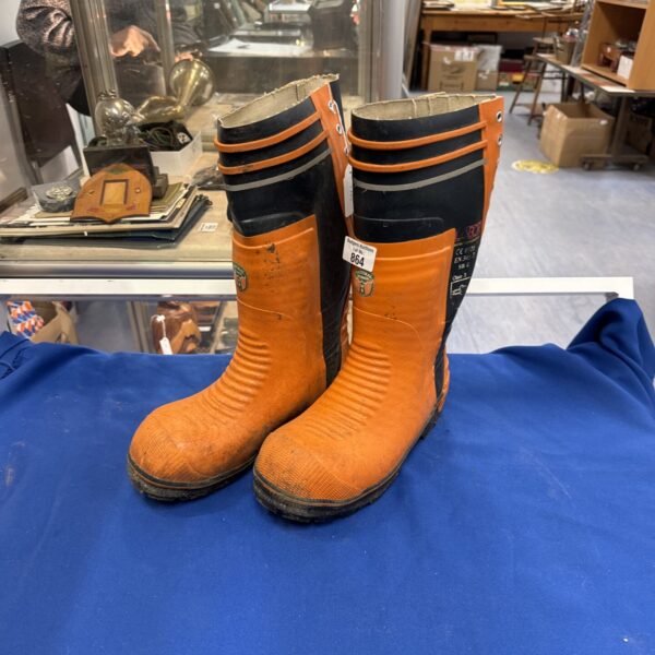 Size 6.5 chainsaw boots for forestry and work.