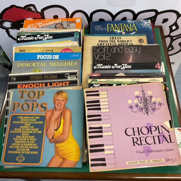 Vintage vinyl record collection featuring Top of the Pops and Fantasia albums.