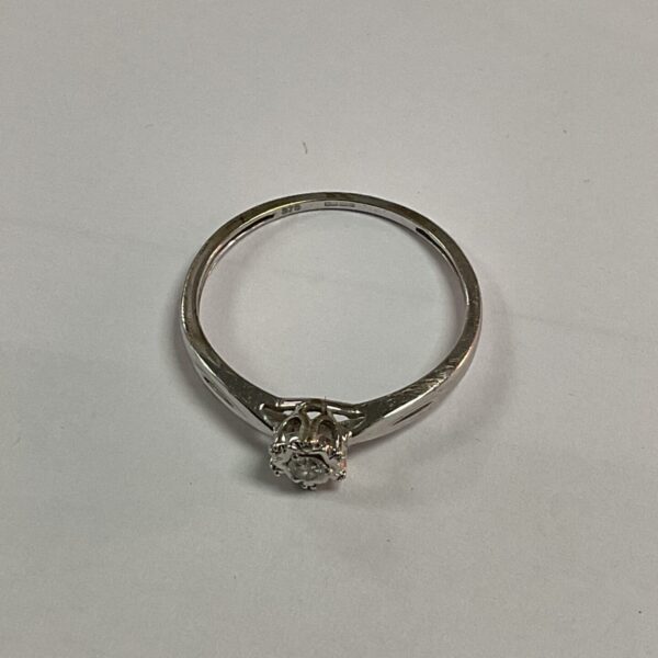 Elegant 9ct gold diamond solitaire ring, size N.