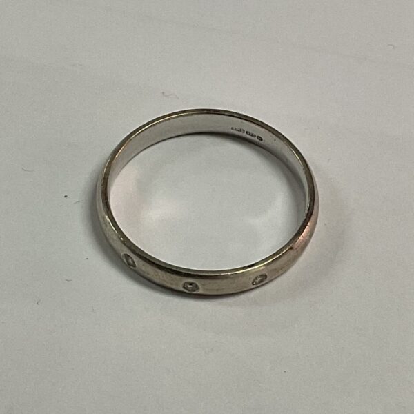 Elegant 9ct white gold diamond ring with hallmarking.